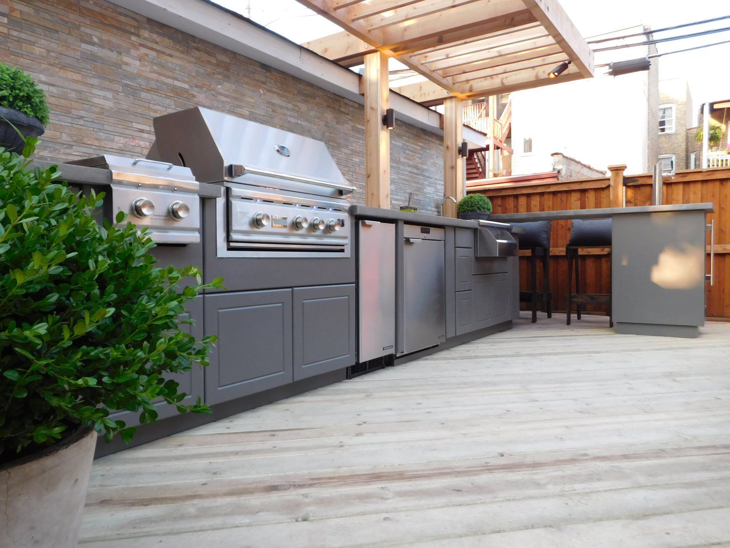 Custom outdoor kitchen built by Smoky Mountain Deck Builders